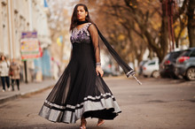Pretty Indian Girl In Black Saree Dress Posed Outdoor At Autumn Street.
