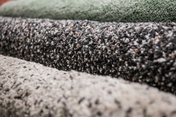 Wall Mural - Set of three different colorful artificial shaggy carpets.