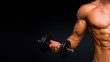 © Stavros - cropped image of male body, shirtless, portrait training with dumb-bell