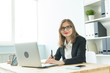 © satura_ - Photography and graphic art concept - Graphic designer using her tablet in a bright office.