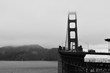 The golden gate bridge in the fog. San Francisco, CA.