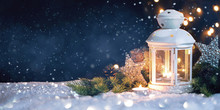 Christmas Lantern On Snow With Decorations. New Year's Card