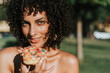 © Rawpixel.com - Beautiful woman eating a doughnut