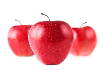 Three red apples on white background. Isolated on white. Healthy eating