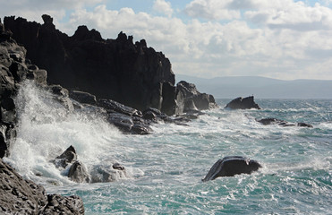 Rocky ocean coast, waves, Iturup island, Kuril islands, Russia