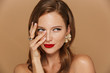 © Drobot Dean - Close up of a beautiful young woman wearing makeup