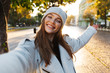 © Drobot Dean - Beautiful young woman dressed in autumn coat and hat