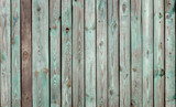 Fototapeta Do pokoju - The old wooden walls painted green. Old wooden wall background or texture.