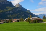 Fototapeta Konie - Mountain village view in Switzerland.