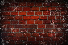 Abstract Christmas Background. Red Brick Wall Close-up, Texture, Background, Grunge. White Snowflakes On Brick Wall Background. Vignette, Copy Space