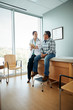 © Gregory Miller - Doctor examining man