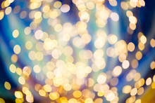 Abstract Blue And Yellow Christmas  Light Background.