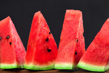 Wall Mural - Four triangular wedges of watermelon