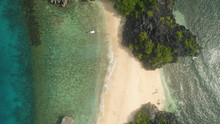 Aerial View Island With Sand Beach And Turquoise Water In Blue Lagoon Among Coral Reefs, Caramoan Islands, Philippines. Landscape With Sea, Tropical Beach.