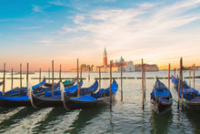 Beautiful View Of The Gondolas And The Cathedral Of San Giorgio Maggiore, On An Island In The Venetian Lagoon, Venice, Italy
