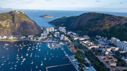 Aerial view on the drone cove of Botafogo in Rio de Janeiro, sea and boats in the late afternoon