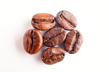 Wall Mural - close up of roasted coffee beans isolated on white background