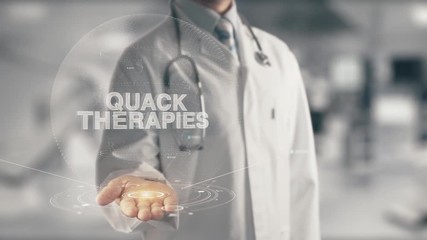 Canvas Print - Doctor holding in hand Quack Therapies