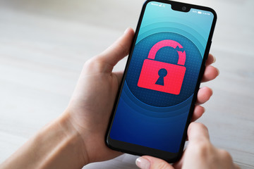 security breach unlock padlock icon on mobile phone screen. cyber protection concept.