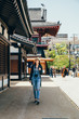 © PR Image Factory - girl sightseeing in japanese temple