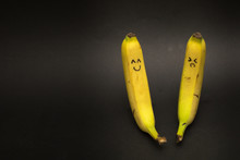 Two Bananas Are Standing Next To One Cheerful And The Other In A Depression