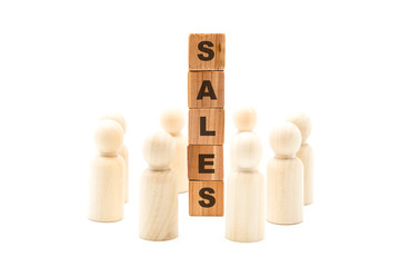 Wall Mural - Wooden figures as business team in circle around word SALES