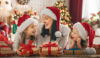 Wall Mural - family celebrating Christmas