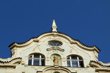 Pediment of a building typical of Prague, Czech Republic