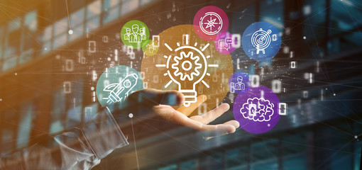 Poster - cloud of colorfull start up icon bubble with data businessman holding a binary 3d rendering