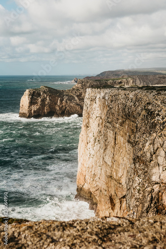 Fotografia, Obraz Beautiful view of the Atlantic Ocean and coastal cliffs off the coast of Portugal on a sunny day