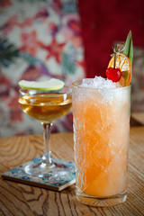 Wall Mural - different colorful alcohol and non-alcohol cocktails in the glasses on the table