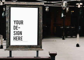 Canvas Print - Rustic wooden signboard mockup at a restaurant