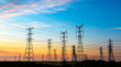© ABCDstock - high-voltage power lines at sunset,high voltage electric transmission tower