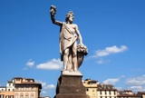 Dionysus sculpture standing on street of Florence. The god of the grape-harvest, winemaking and wine under the streets of historical Firenze, Italy
