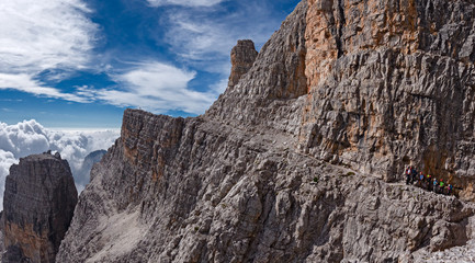 Wall Mural - mountaineers equipped face the 