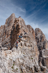 Wall Mural - mountaineers equipped face the 
