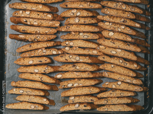 Valokuva Italian Biscotti cookies dry on the baking sheet