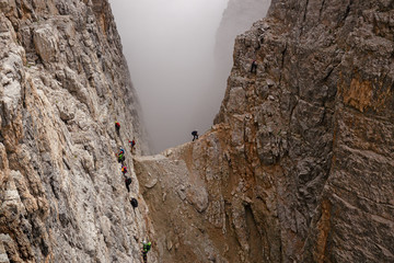 Wall Mural - mountaineers equipped face the 