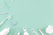 Flat Lay Composition With Manual Toothbrushes And Oral Hygiene Products On Mint Background Stomatologist Mock Up Copy Space. Teeth Care Frame Concept