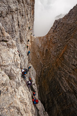 Wall Mural - mountaineers equipped face the 