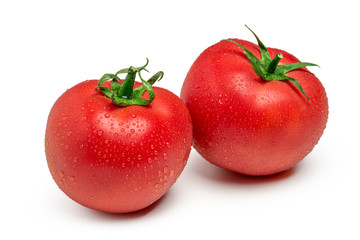 Tomatoes isolated on white background. Two fresh raw vegetables