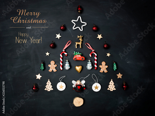 Fotografía merry christmas lettering and christmas tree shaped out of different Christmas d