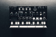 black analog synthesizer, close-up view