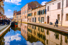 Comacchio Vale Ferrara Province Emilia Romagna Region Cycling In Italy Blue Sky Over Canal