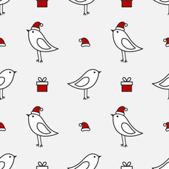 Wall Mural - christmas birds with santa hats and presents seamless pattern.