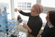 © as-artmedia - Technical vocational training with young female muslim teacher. Education and technology concept.