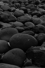 Big Smooth Black Beach Stones Background