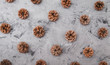 Pinecones on stone background. Christmas decorations. 