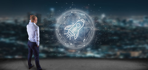 Poster - Businessman in front of a  start up rocket on a sphere 3d rendering