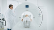 © Gorodenkoff - In Medical Laboratory Male Radiologist Controls MRI or CT or PET Scan with Female Patient Undergoing Procedure. Doctor Conducts Emergency Scanning with Advanced Medical Technologies.